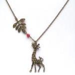 Antiqued Brass Leaf Giraffe Coral Necklace