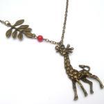 Antiqued Brass Leaf Giraffe Coral Necklace