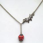Antiqued Brass Leaf Red Porcelain Ladybug Necklace