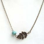 - Antiqued Brass Leaf Green Turquoise Necklace