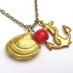 Antiqued Brass Anchor Shell Red Coral Necklace