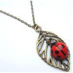 Antiqued Brass Leaf Porcelain Ladybug Necklace