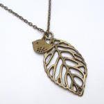 Antiqued Brass Leaf Bird Necklace